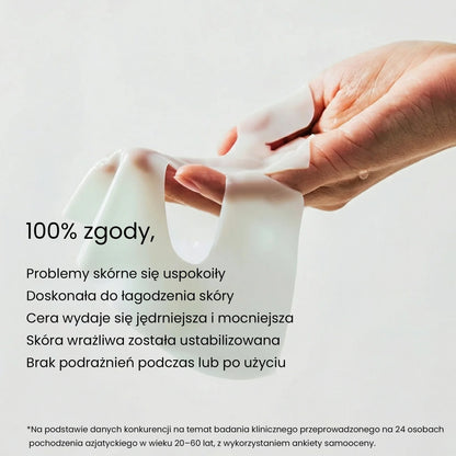 Hand holding QueenSkin hydrogel face mask, skincare product for soothing and firming skin